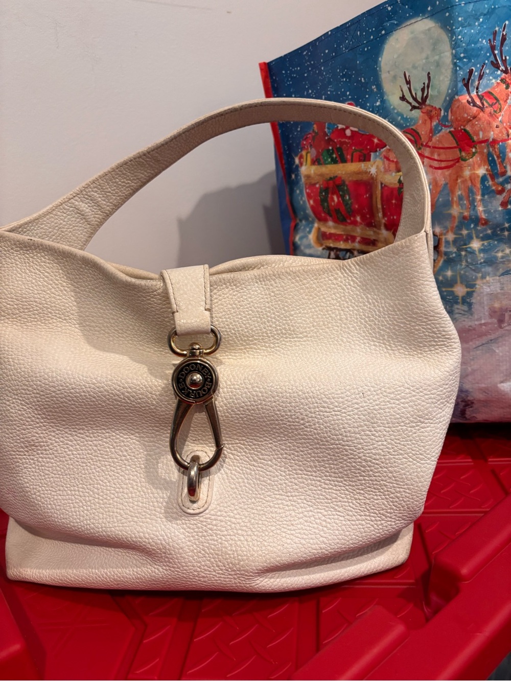 Dooney & Burke leather cream Hobo w/ Logo